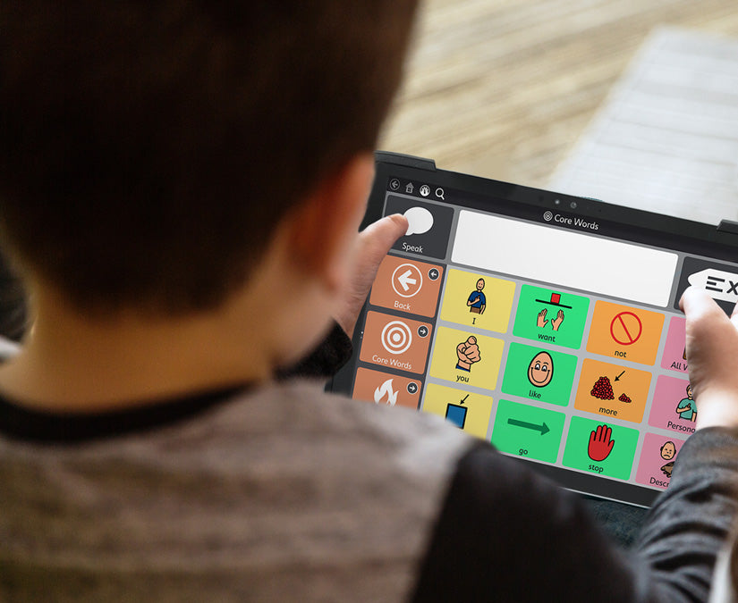 Kid using Tobii Dynavox EM-12 Surface Pro tablet with Durable Case