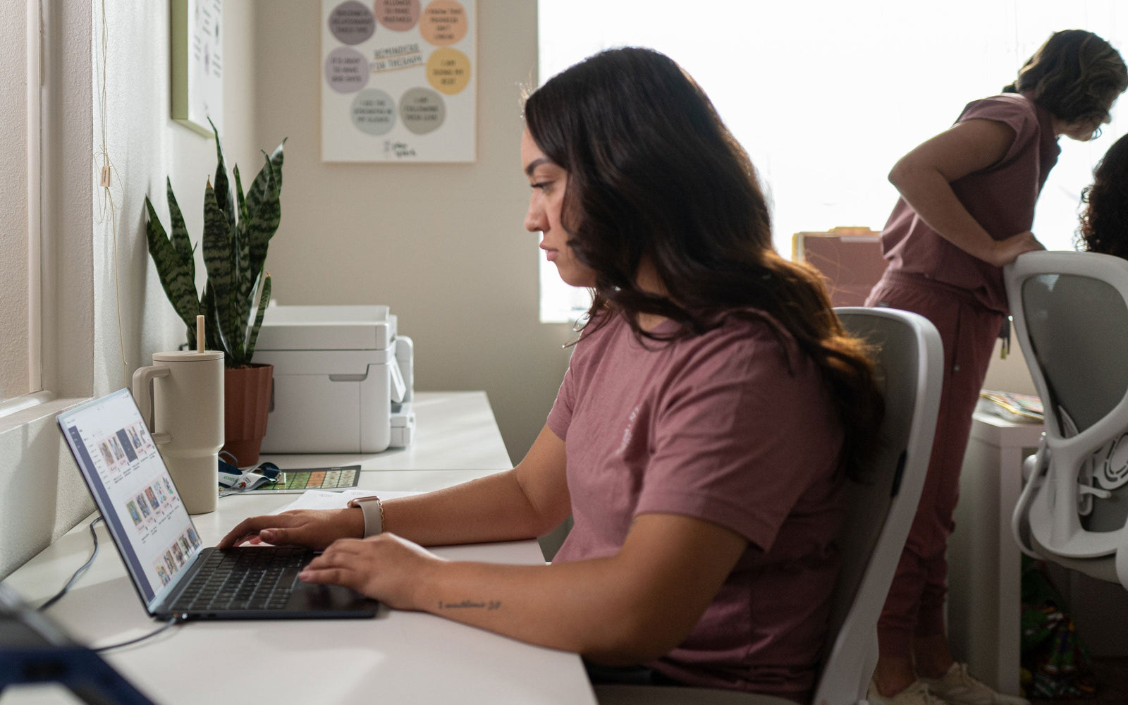 Speech-language pathologist completing AAC training through the Tobii Dynavox Learning Hub using on-demand courses and live workshops.